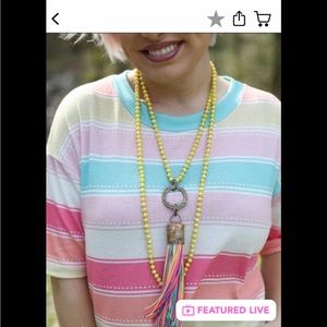 Bead necklace with colorful tassels